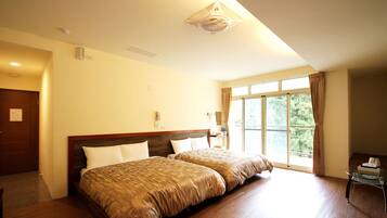 Premium Quadruple Room | Free WiFi, bed sheets