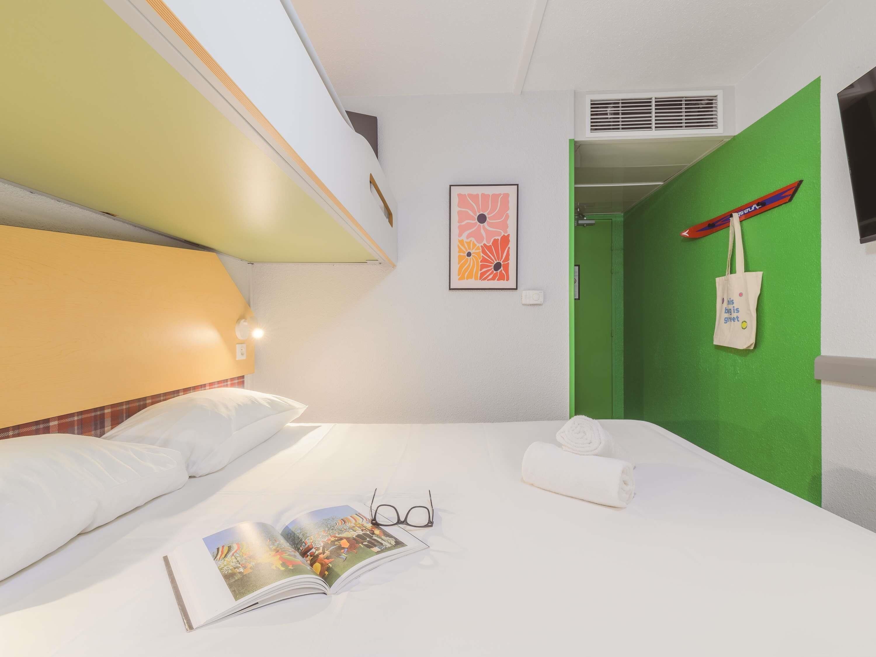 Triple Room (PURE) | Desk, blackout drapes, iron/ironing board, free cribs/infant beds