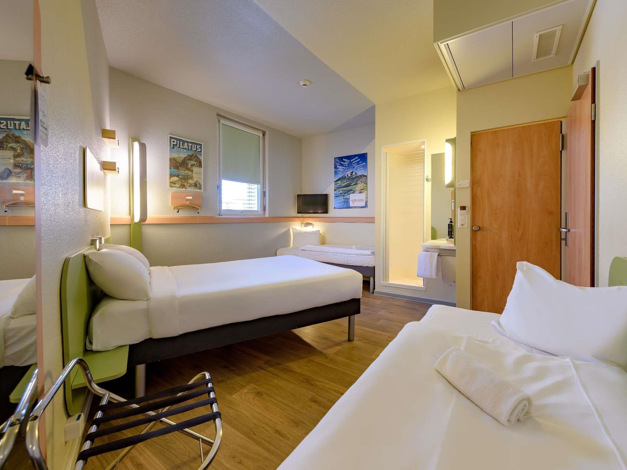 Family Twin Room, Multiple Beds | In-room safe, desk, laptop workspace, soundproofing