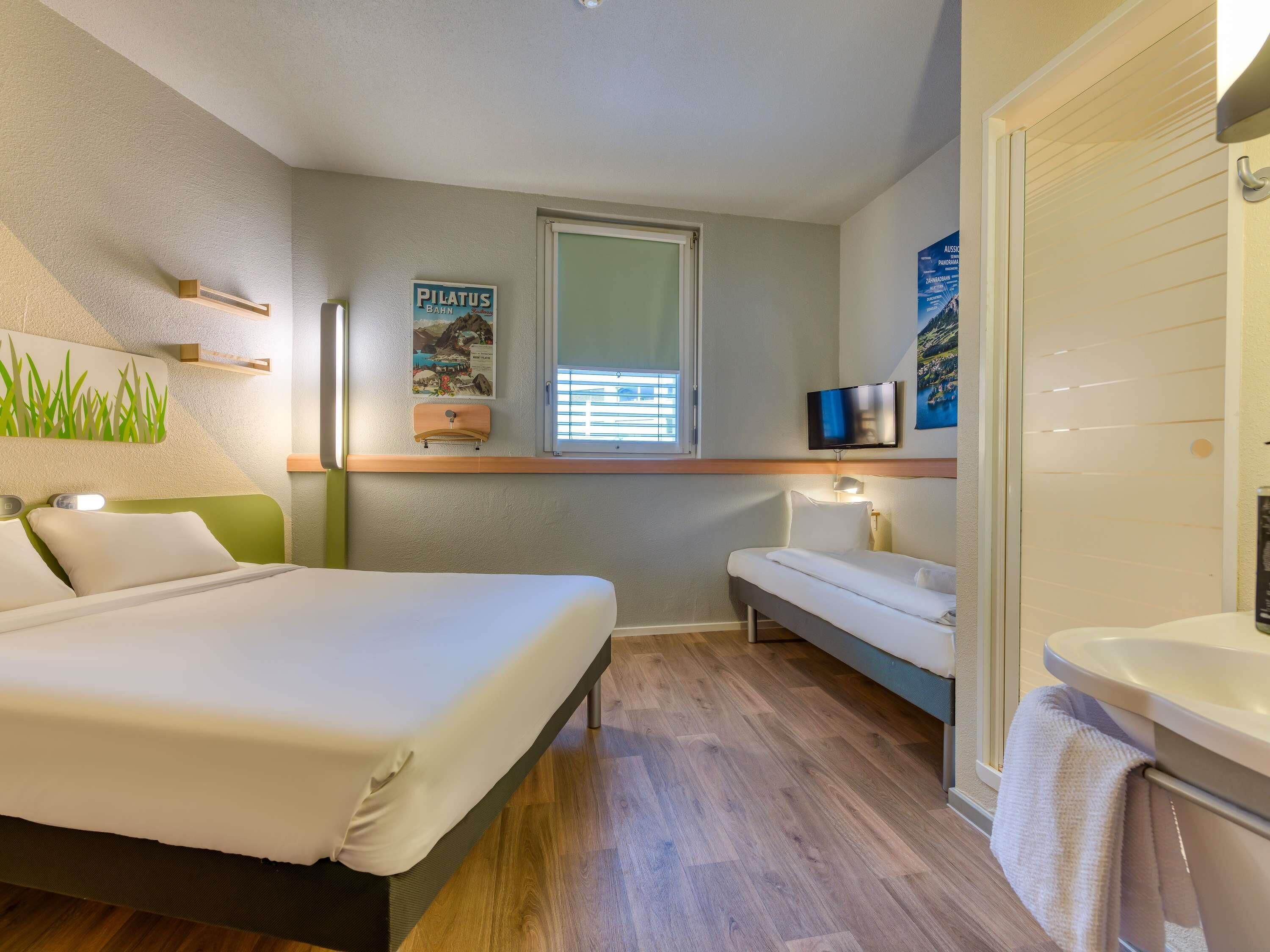Family Twin Room, Multiple Beds | In-room safe, desk, laptop workspace, soundproofing