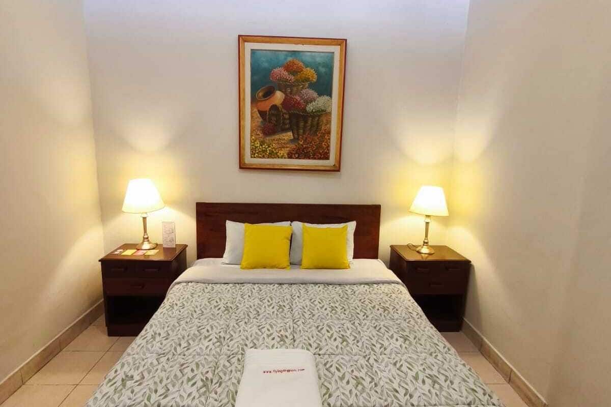Basic Double Room, 1 Queen Bed, Shared Bathroom | Free WiFi, bed sheets