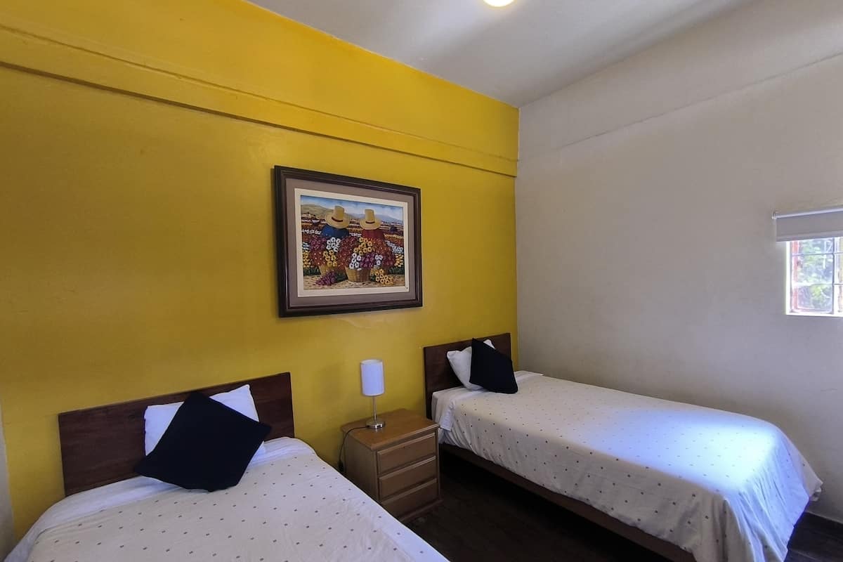 Basic Twin Room, Multiple Beds, Shared Bathroom | Free WiFi, bed sheets