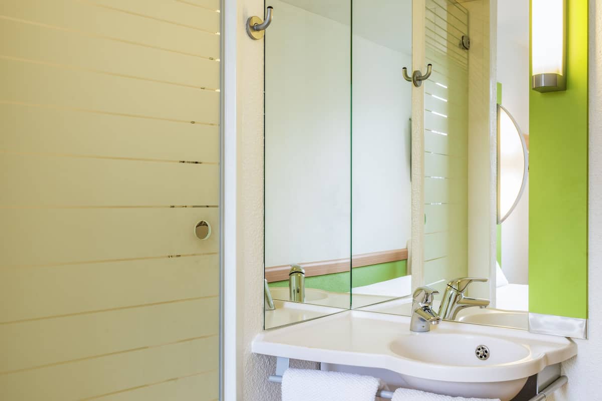 shower, eco-friendly toiletries, hair dryer, towels