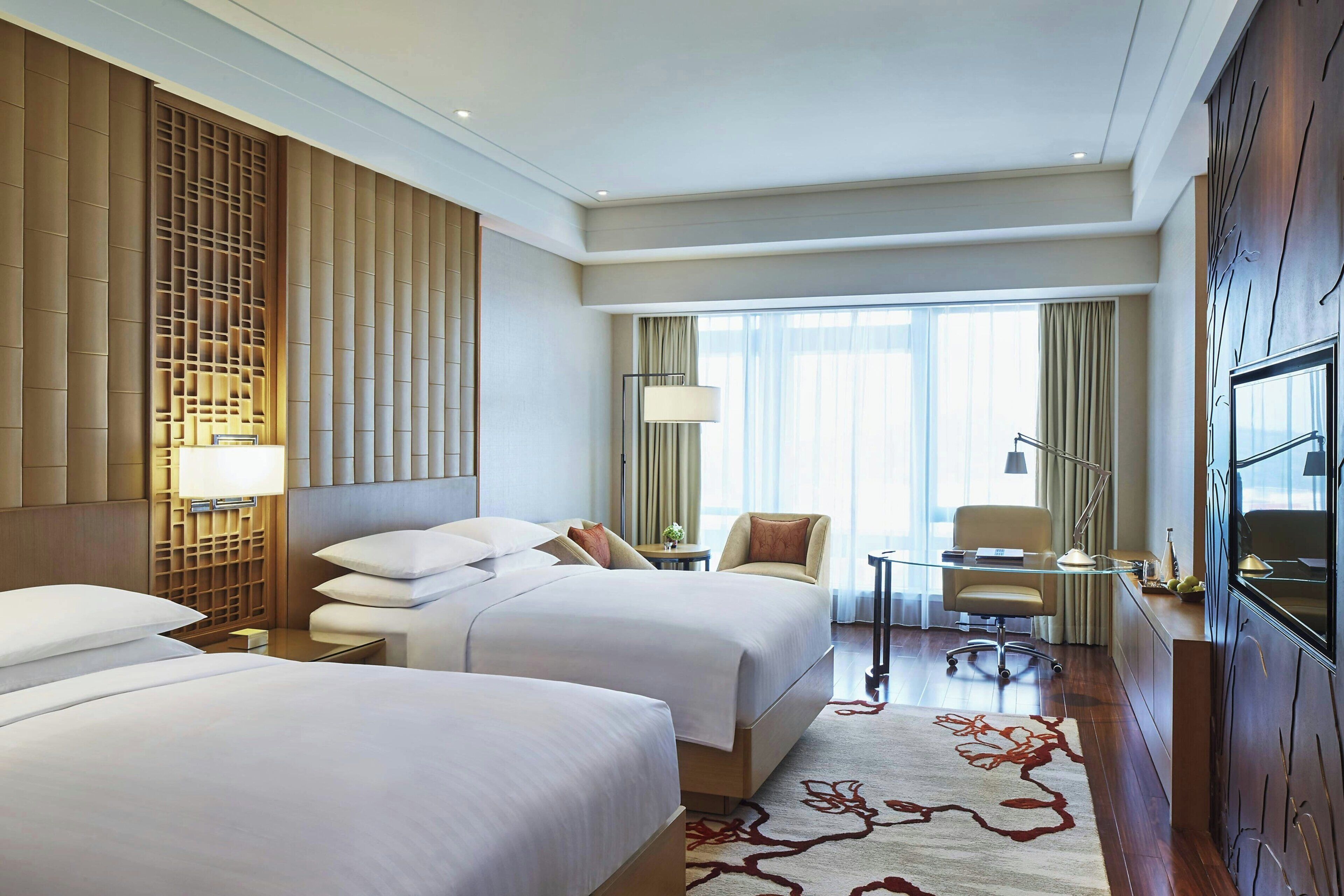 Premium bedding, down comforters, minibar, in-room safe