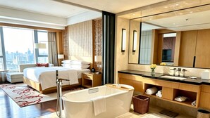 Premium bedding, down comforters, minibar, in-room safe