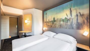 Doppelzimmer | Schreibtisch, Verdunkelungsvorhänge, schallisolierte Zimmer