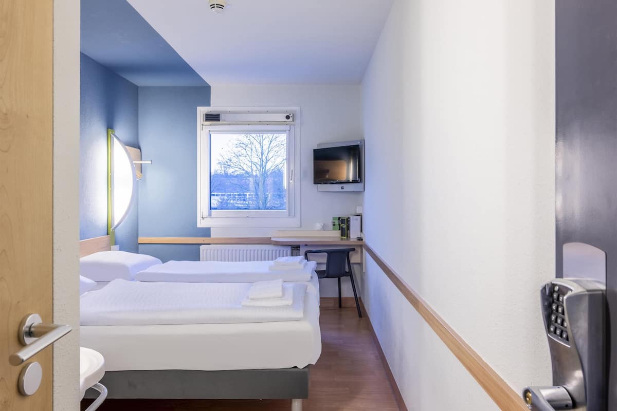 Quarto duplo | Escrivaninha, cortinas blackout, quartos à prova de som