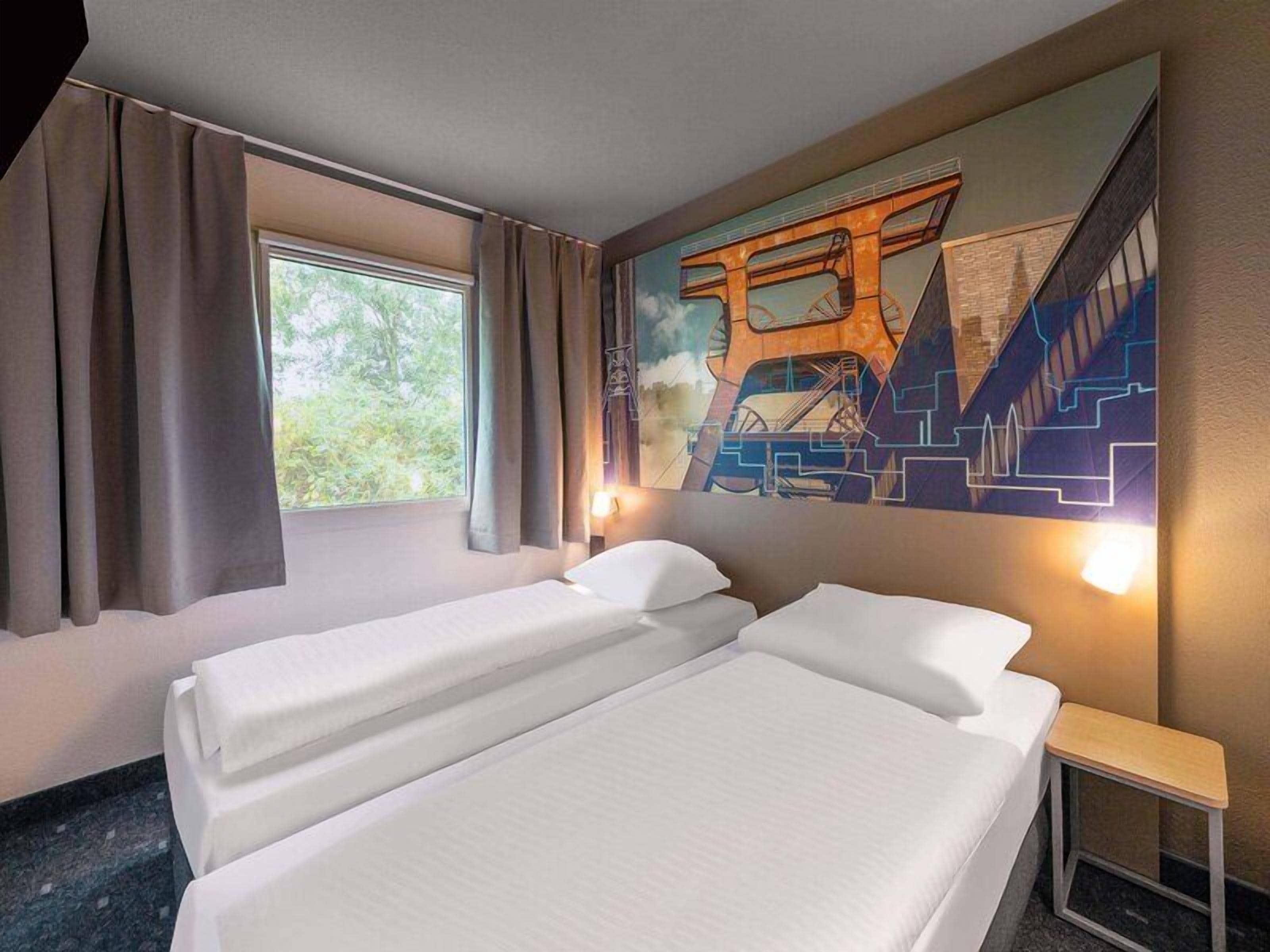 Twin kamer | Een bureau, gratis wifi, beddengoed