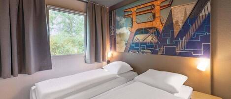 Twin kamer | Een bureau, gratis wifi, beddengoed