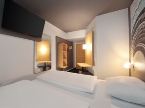 Habitación doble | Escritorio, insonorización, wifi gratis y ropa de cama 