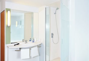 Shower, eco-friendly toiletries, hair dryer, towels