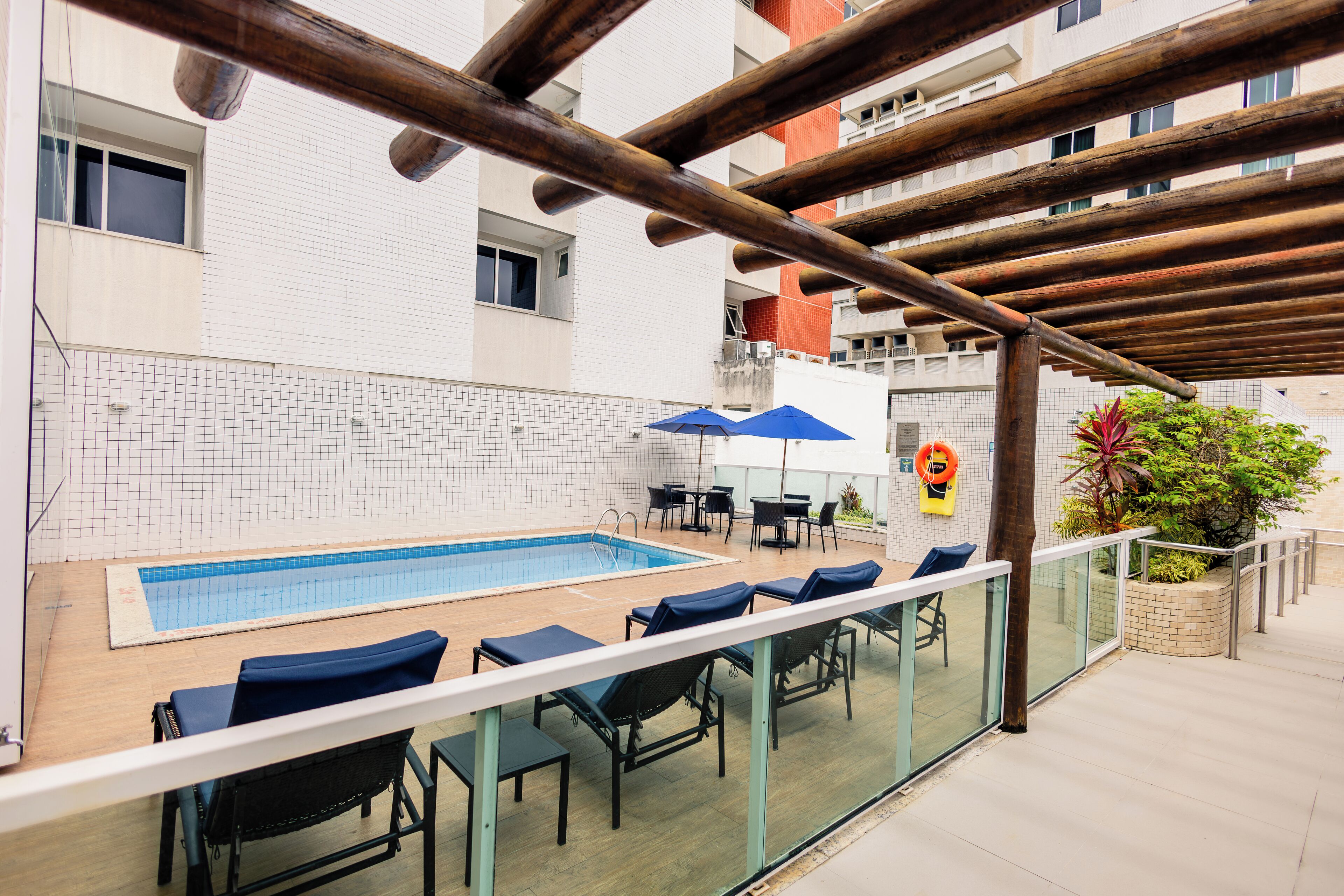 Outdoor pool, open 7:00 AM to 8:00 PM, pool umbrellas, sun loungers