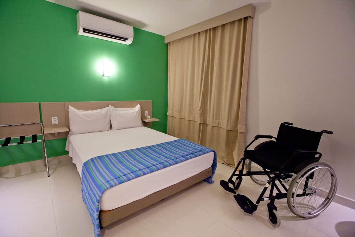 Standard Room Handicap | Minibar, in-room safe, individually decorated, desk