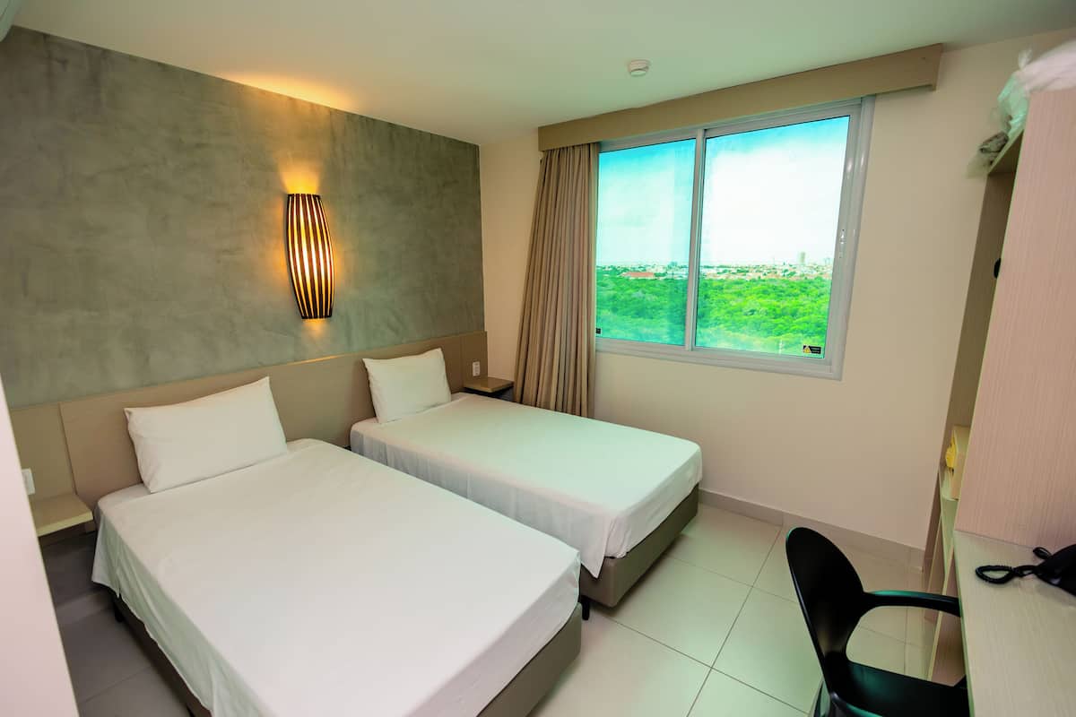 Standard Twin Room, 2 Twin Beds | Minibar, in-room safe, individually decorated, desk