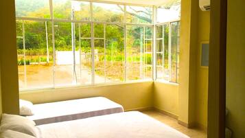 Superior Triple Room, 1 Bedroom, Pool View | In-room safe, free cribs/infant beds, rollaway beds, free WiFi