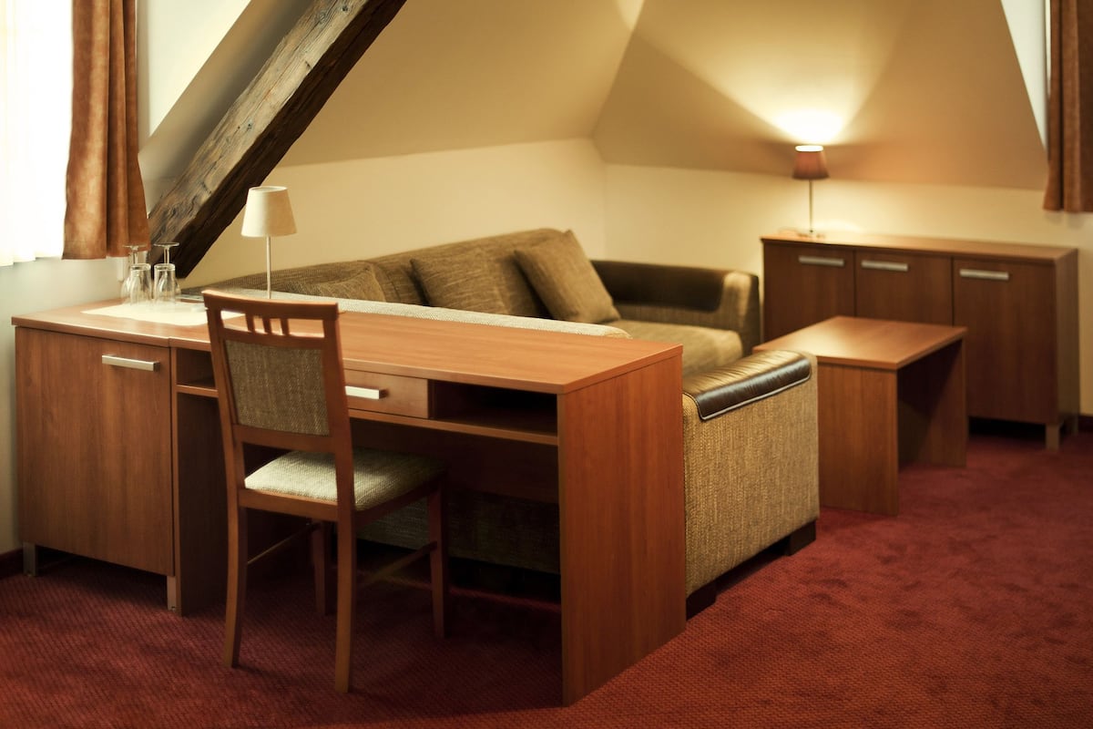 deluxe apartment, 2 bedrooms | living area | flat-screen tv