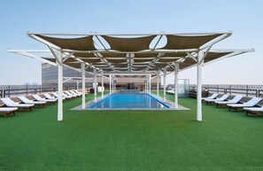 Outdoor pool, open 8:00 AM to 10:00 PM, pool umbrellas, sun loungers