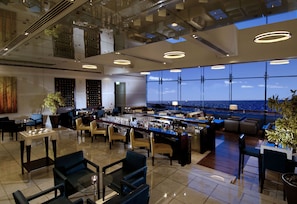 5 bars/lounges, brewpub, karaoke bar