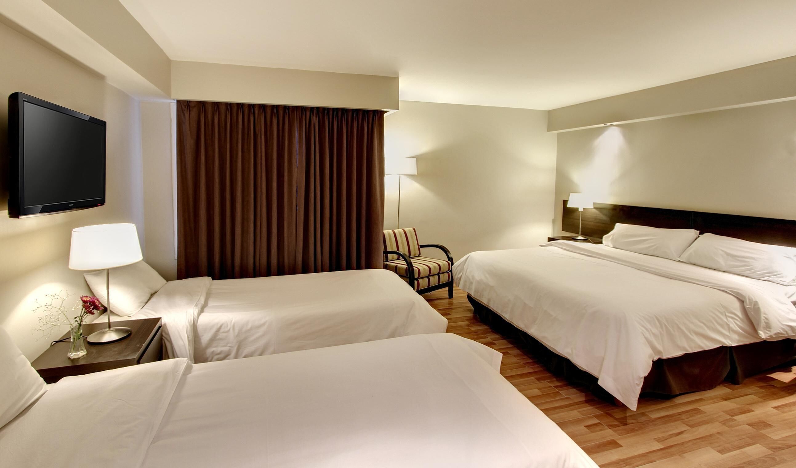 Premium bedding, in-room safe, blackout curtains, soundproofing