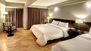 Premium bedding, in-room safe, blackout curtains, soundproofing