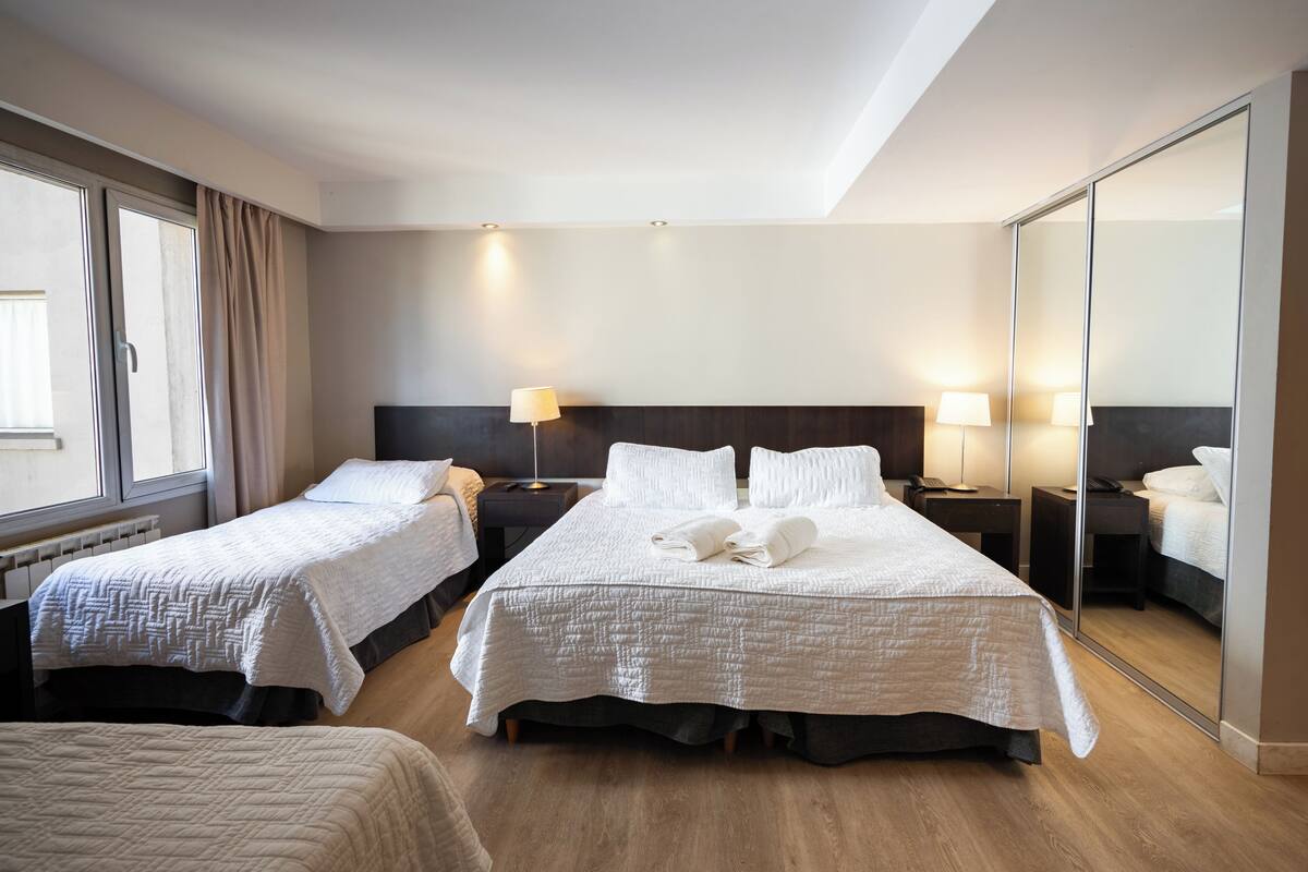 Premium bedding, in-room safe, blackout drapes, soundproofing