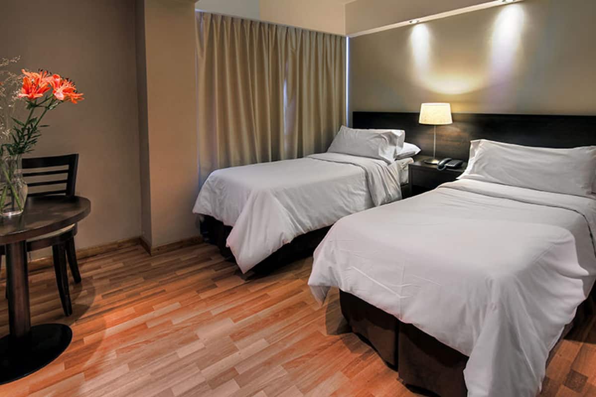 Premium bedding, in-room safe, blackout drapes, soundproofing