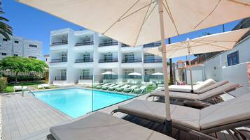 Outdoor pool, pool umbrellas, pool loungers