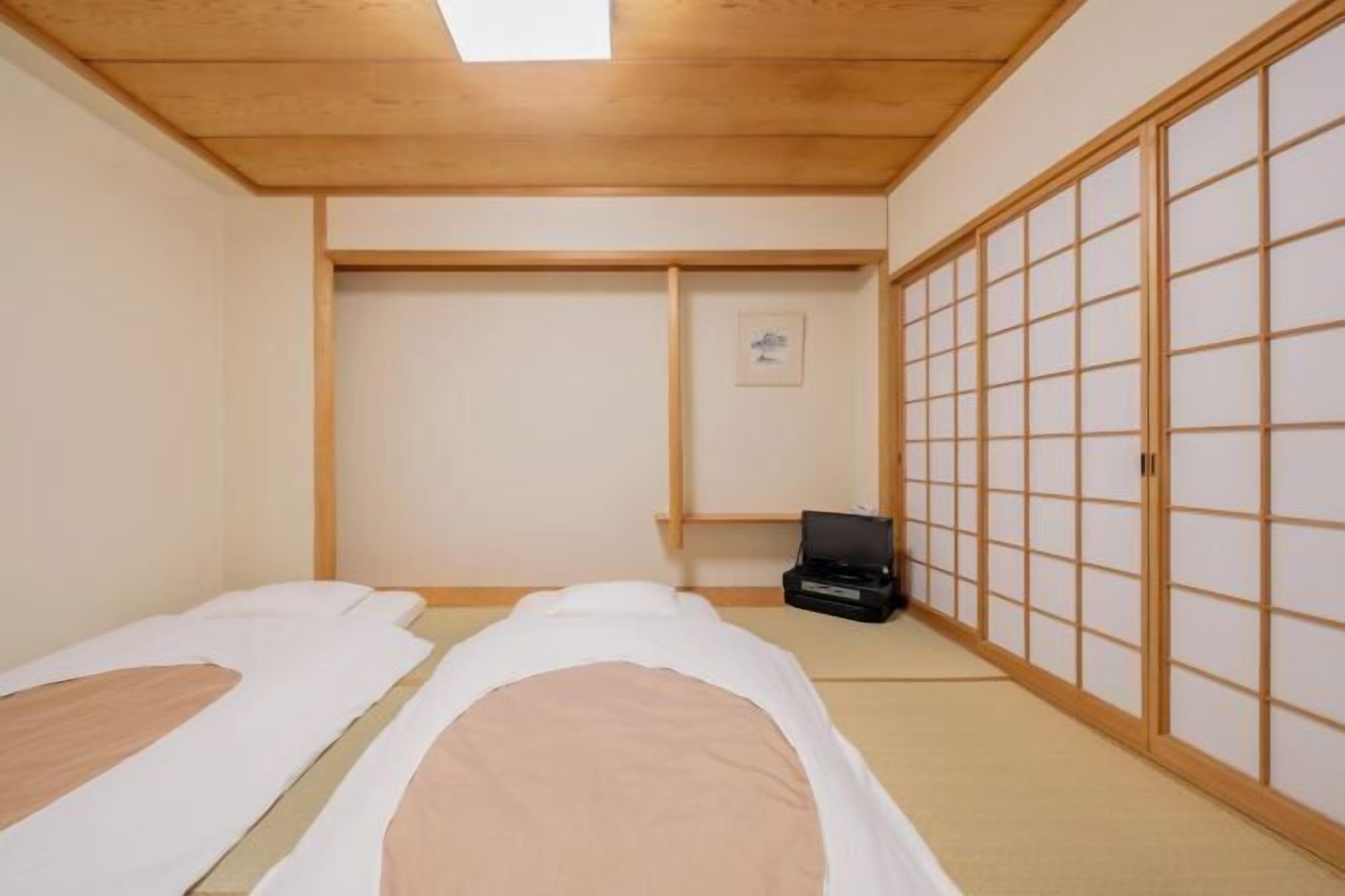 遮光布/窗簾、熨斗/熨衣板、免費無線上網、床單