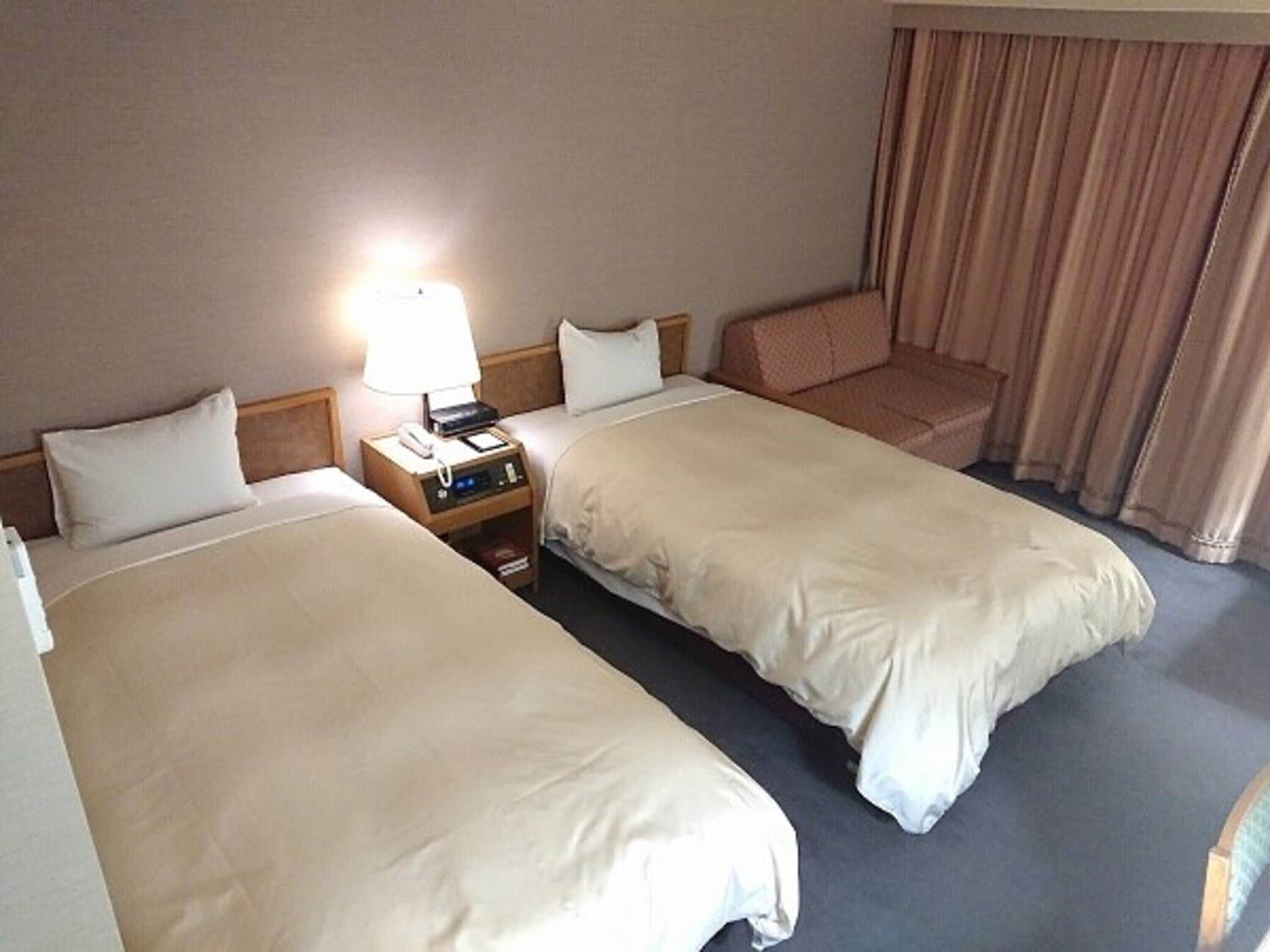 blackout curtains, iron/ironing board, free wifi, bed sheets