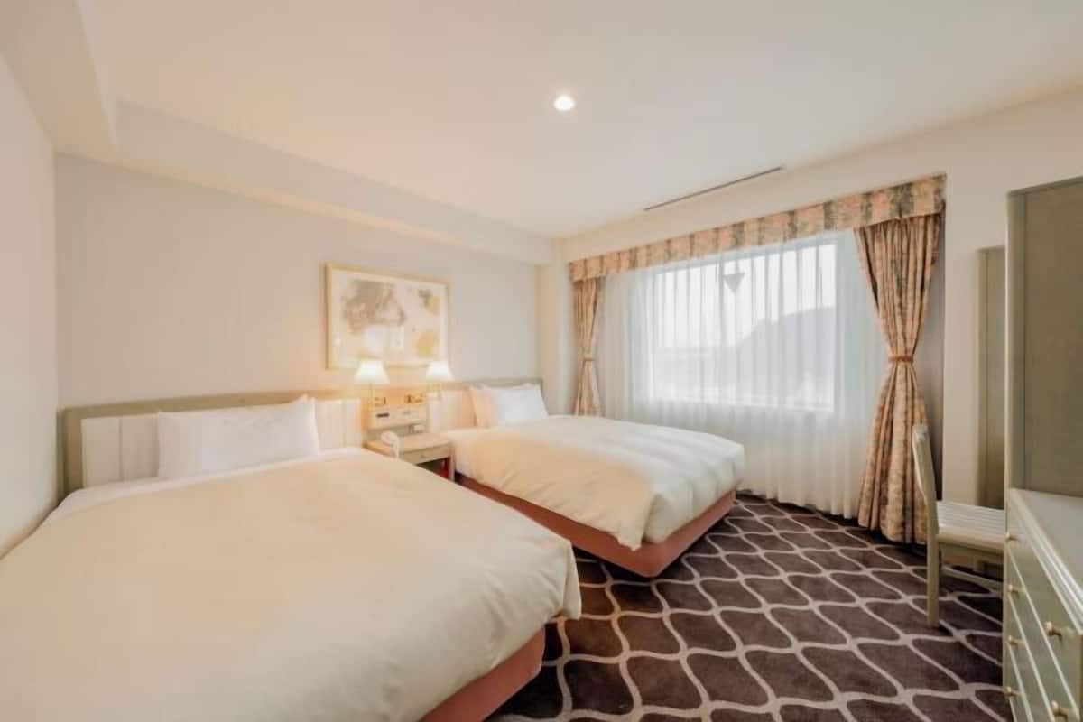 Blackout curtains, iron/ironing board, free WiFi, bed sheets