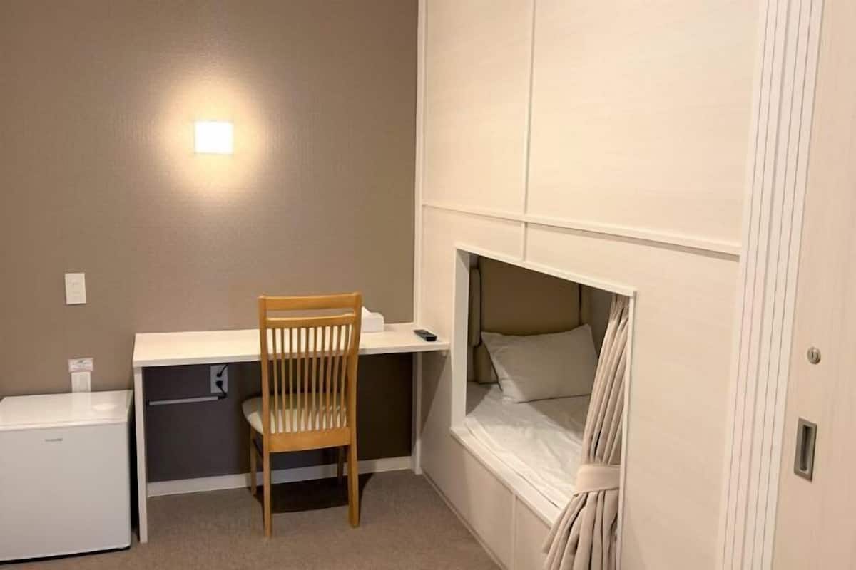 Blackout curtains, iron/ironing board, free WiFi, bed sheets