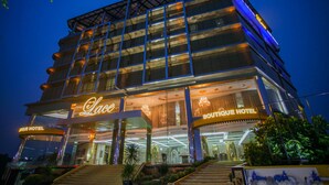 A multi-story hotel with a glass facade, a prominent 'Boutique Hotel' sign, and a staircase leading to the entrance. - Lace Boutique Hotel (Johor Bahru)