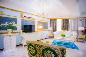 Luxury Suite | Living area | 42-inch LED TV with premium channels, TV, fireplace - Lace Boutique Hotel (Johor Bahru)