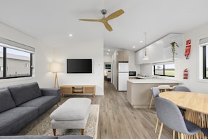 Family Villa, 3 Bedrooms, Pets Allowed | Living area - Swan Bay Holiday Park (Swan Bay)
