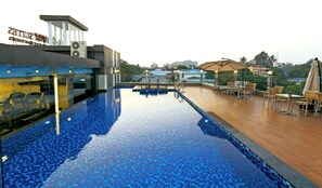 Outdoor pool, open 6:00 AM to 8:00 PM, pool loungers - Clover Suites Royal Lake Yangon (Yangon)