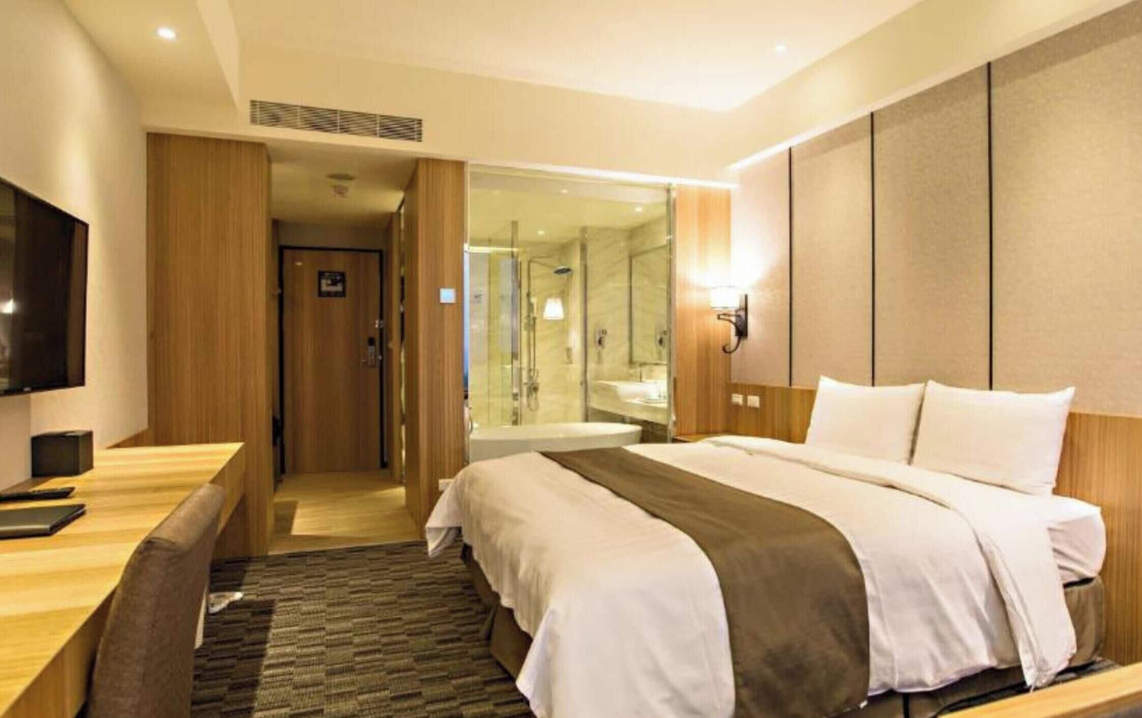 Double Room | Minibar, in-room safe, desk, blackout drapes