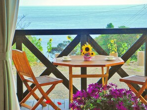 Suite estudio Deluxe, 2 camas individuales, no fumadores, vistas al mar | Terraza o patio