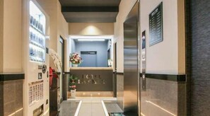 Combined shower/tub, free toiletries, hair dryer, slippers