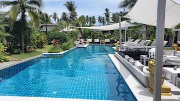 2 outdoor pools, open 8 AM to 9 PM, pool umbrellas, pool loungers