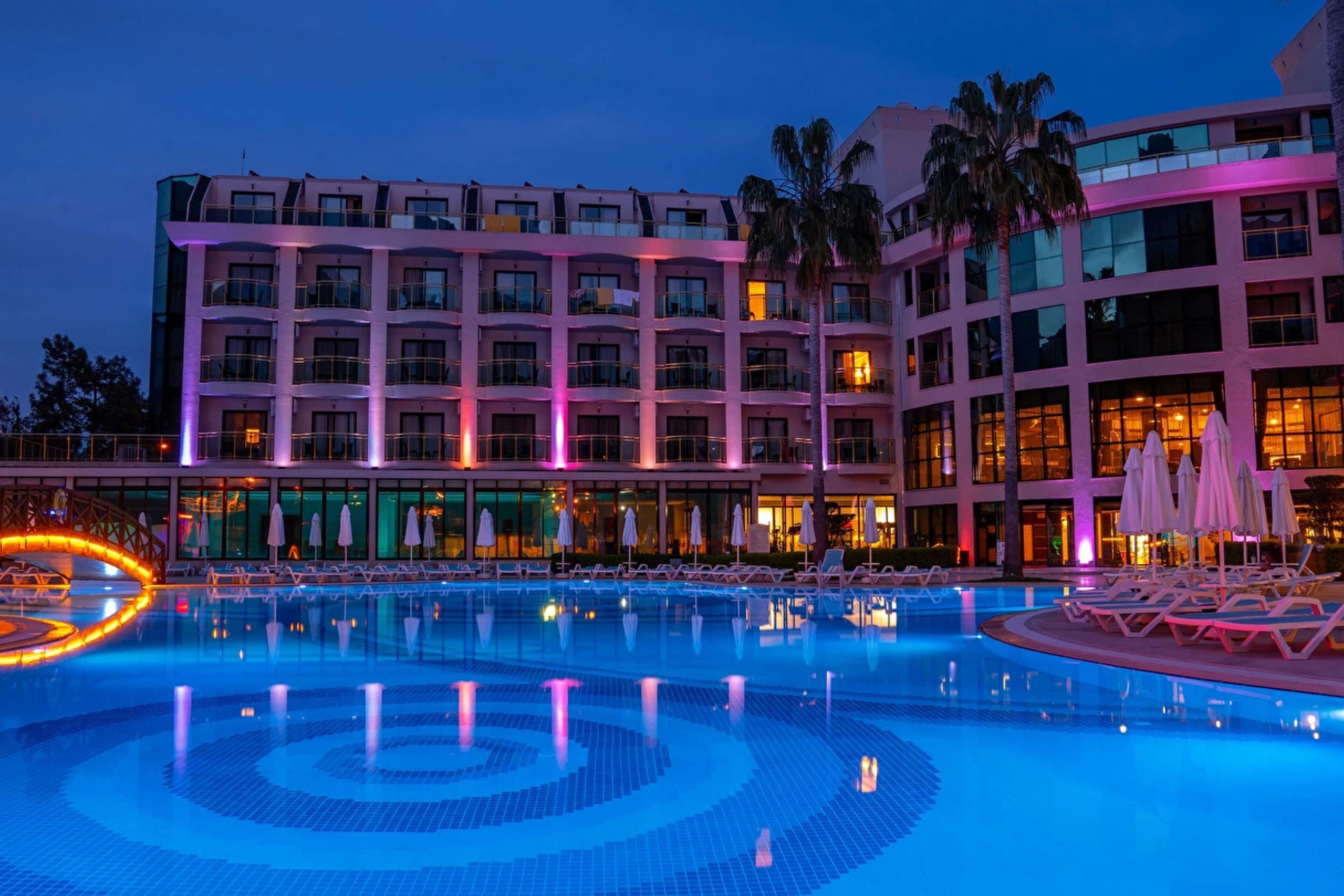 Indoor pool, seasonal outdoor pool, pool umbrellas, pool loungers