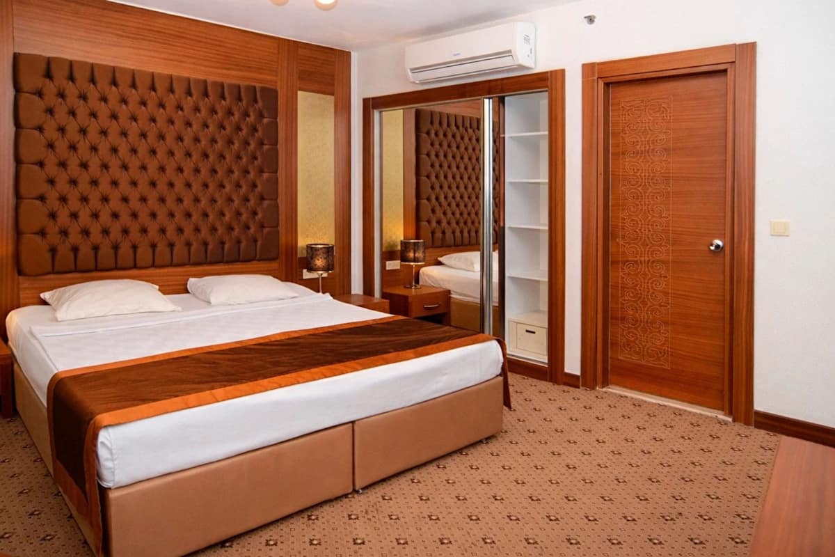 Family Room, 2 Bedrooms, Balcony | Premium bedding, minibar, in-room safe, laptop workspace