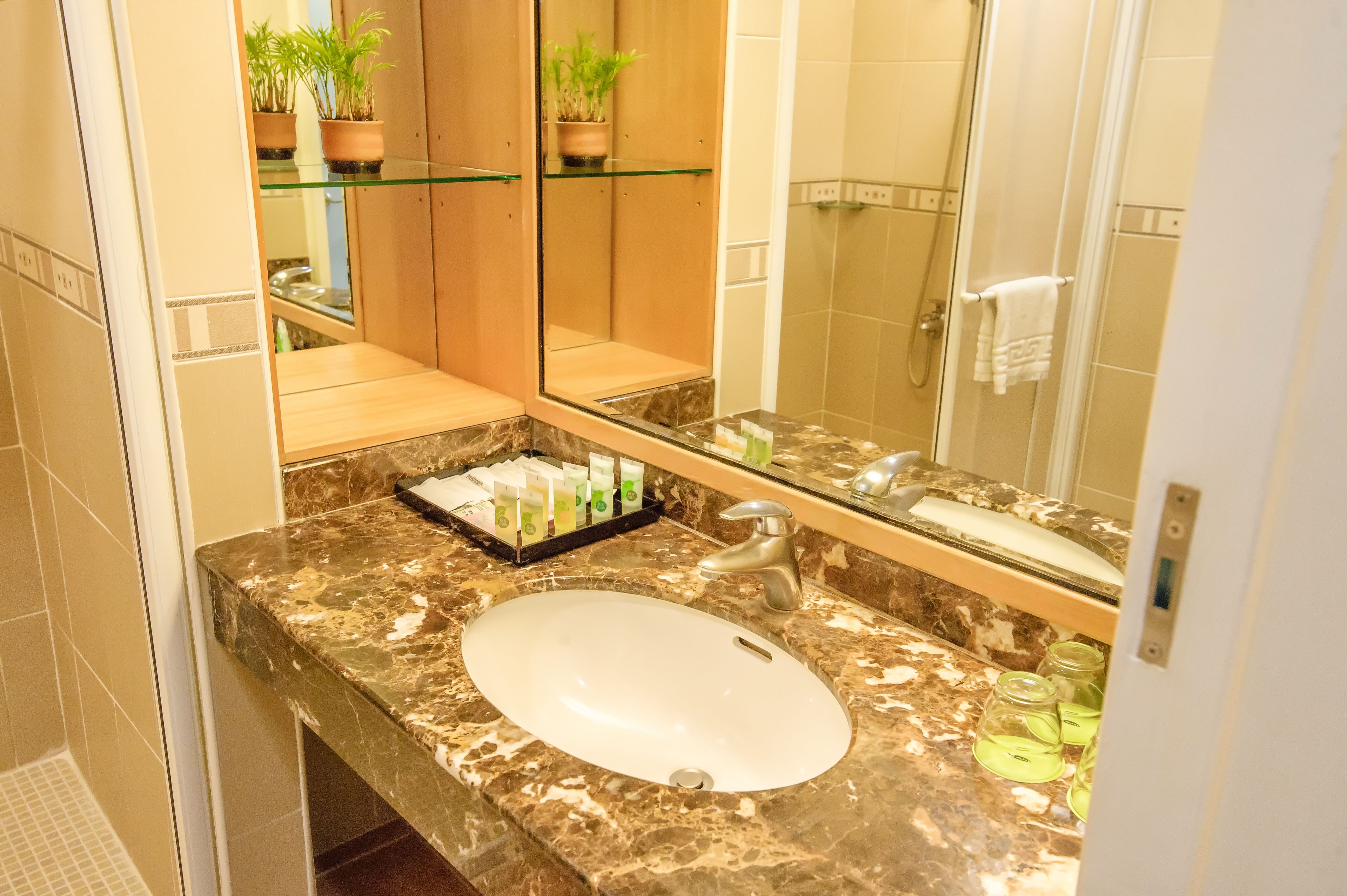 Shower, eco-friendly toiletries, hair dryer, slippers