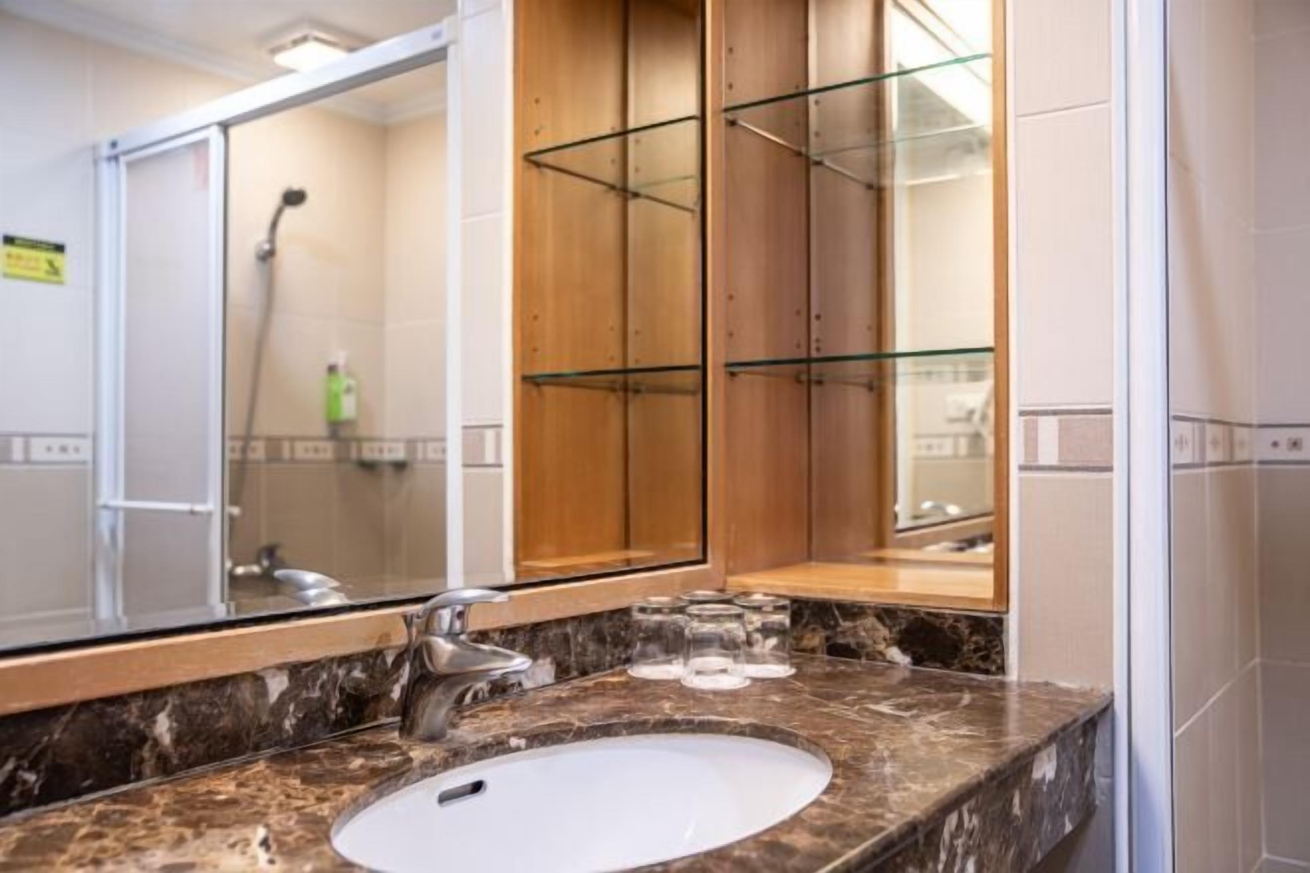 Shower, eco-friendly toiletries, hair dryer, slippers