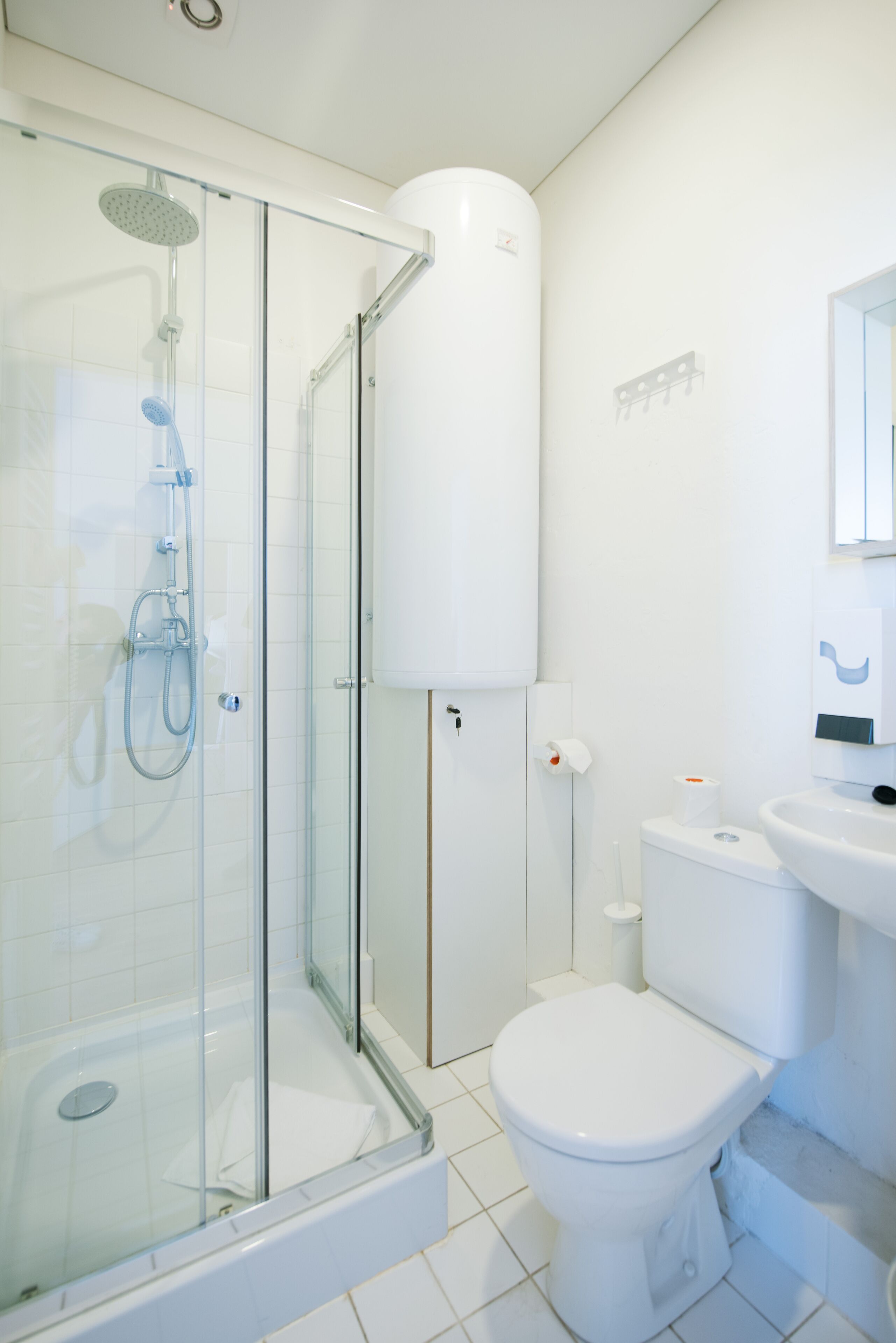 shower, designer toiletries, hair dryer, towels