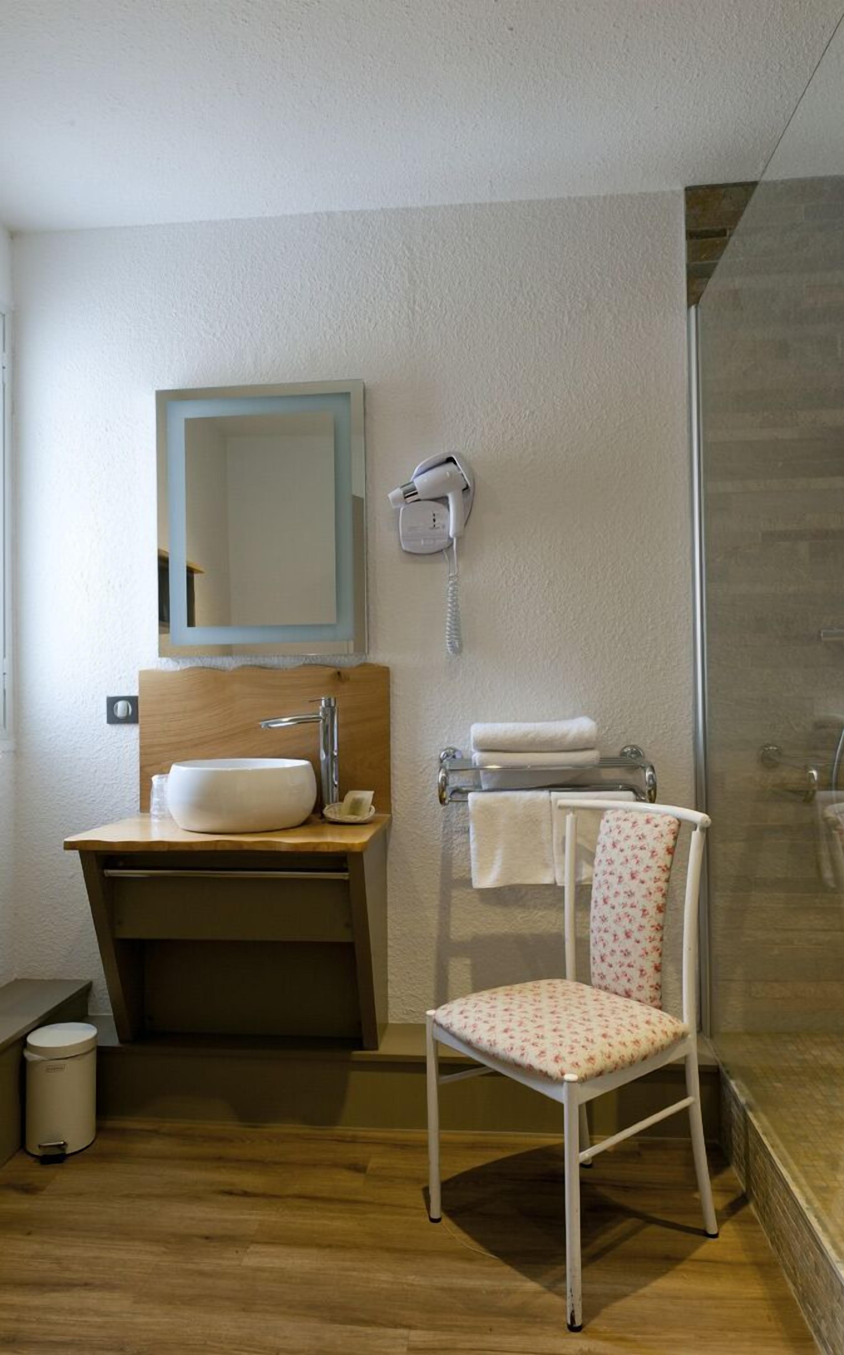 superior twin room | bathroom | shower, free toiletries, hair dryer, towels