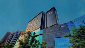 A modern hotel building with a prominent sign for 'Vasala Hotel Jakarta'. - Vasaka Hotel Jakarta managed by DAFAM (Jakarta)