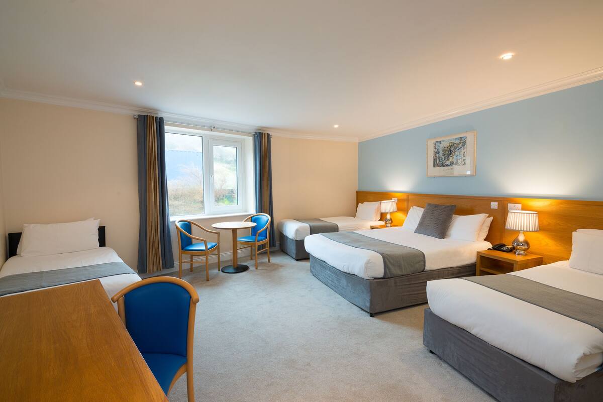 family room | in-room safe, desk, laptop workspace, blackout curtains