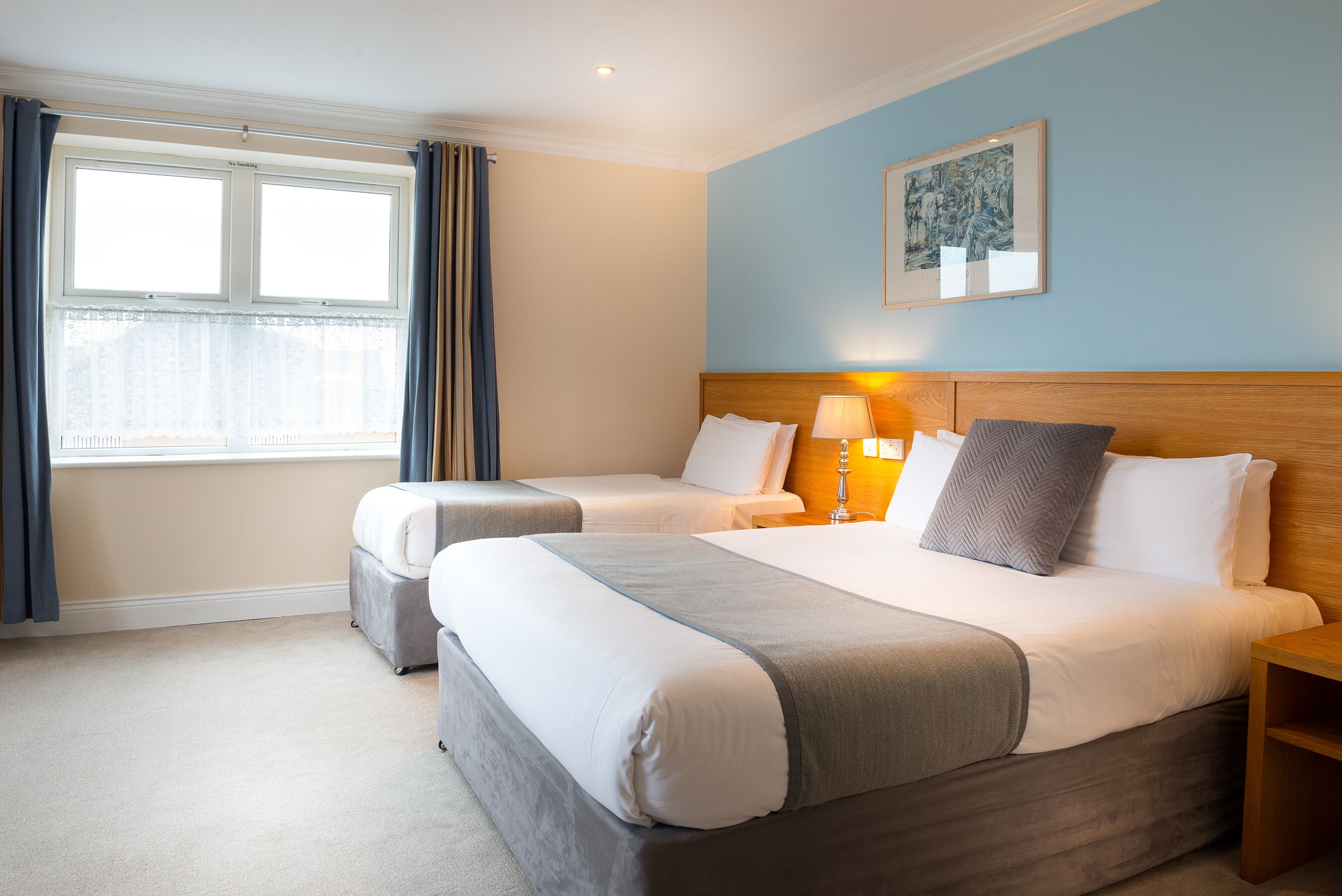 twin room | in-room safe, desk, laptop workspace, blackout curtains