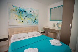 Huoneisto, 2 makuuhuonetta, patio (4 Adults) | Tallelokero huoneessa, äänieristys, ilmaiset vauvansängyt, lisävuoteet