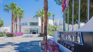 A building with a sign reading "ARMONIA" and a sign for "VIONTA". - Armonia Holiday Village & Spa (Bodrum)